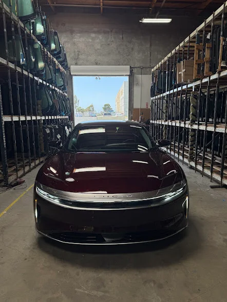 Lucid Air door glass being replaced by a Majesty Auto Glass technician